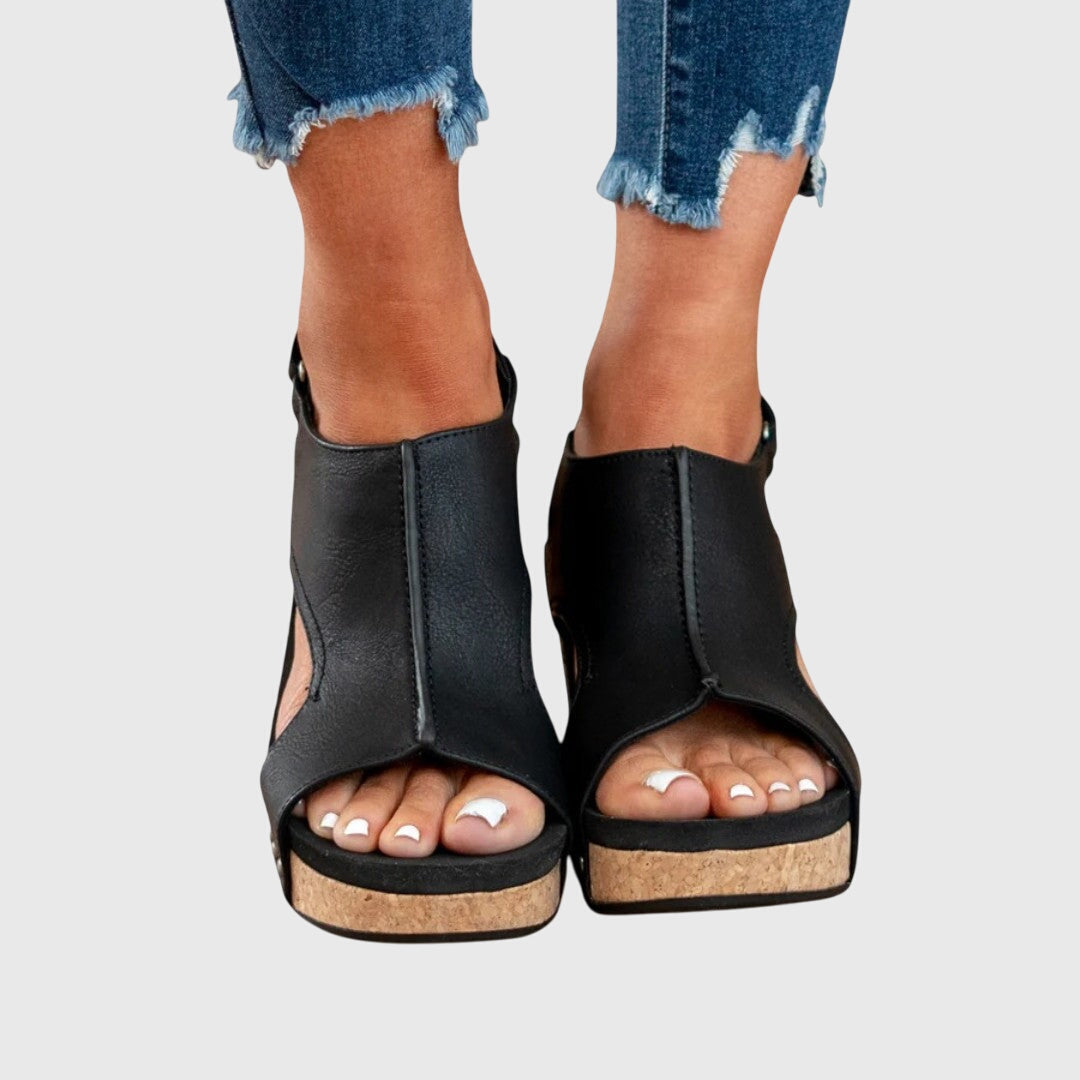 Clara buckle wedge sandals in black