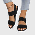 Greta stretch strap sandals in black
